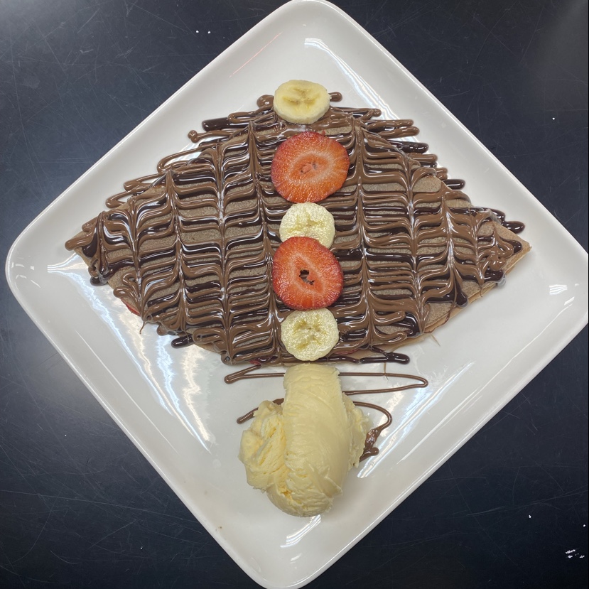 Photo of Orange Crepes and Juice